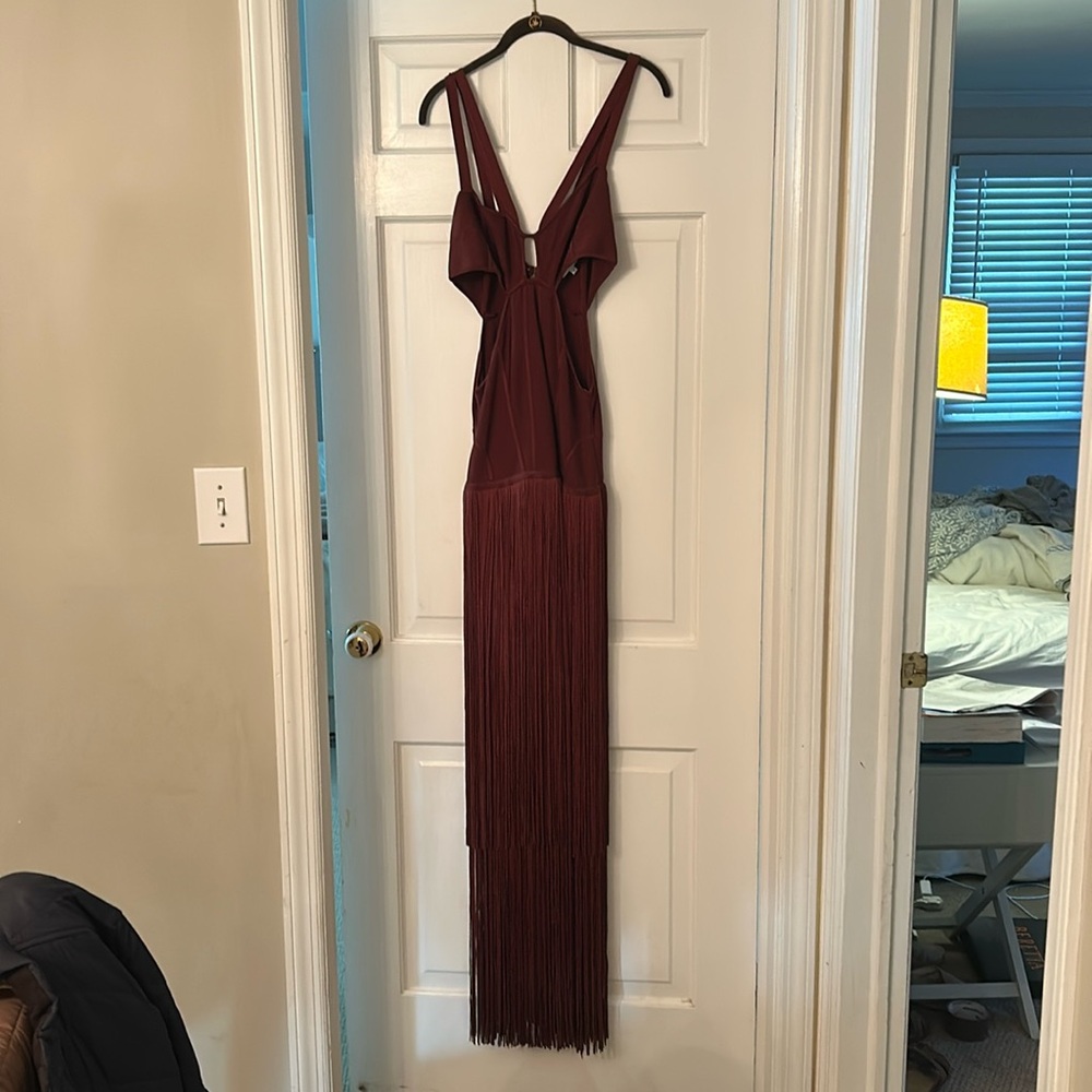 Size Medium NEVERWORN Herve Leger dress. Tags on and is in perfect condition.